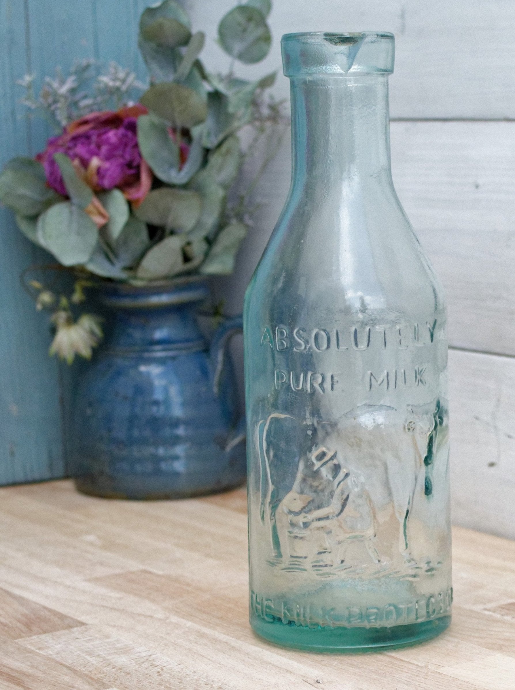 Vintage "ABSOLUTELY PURE Milk" Bottle  "The Milk Protector" Glass Milk Carafe 
Aqua Glassware Farmhouse Cow Scene