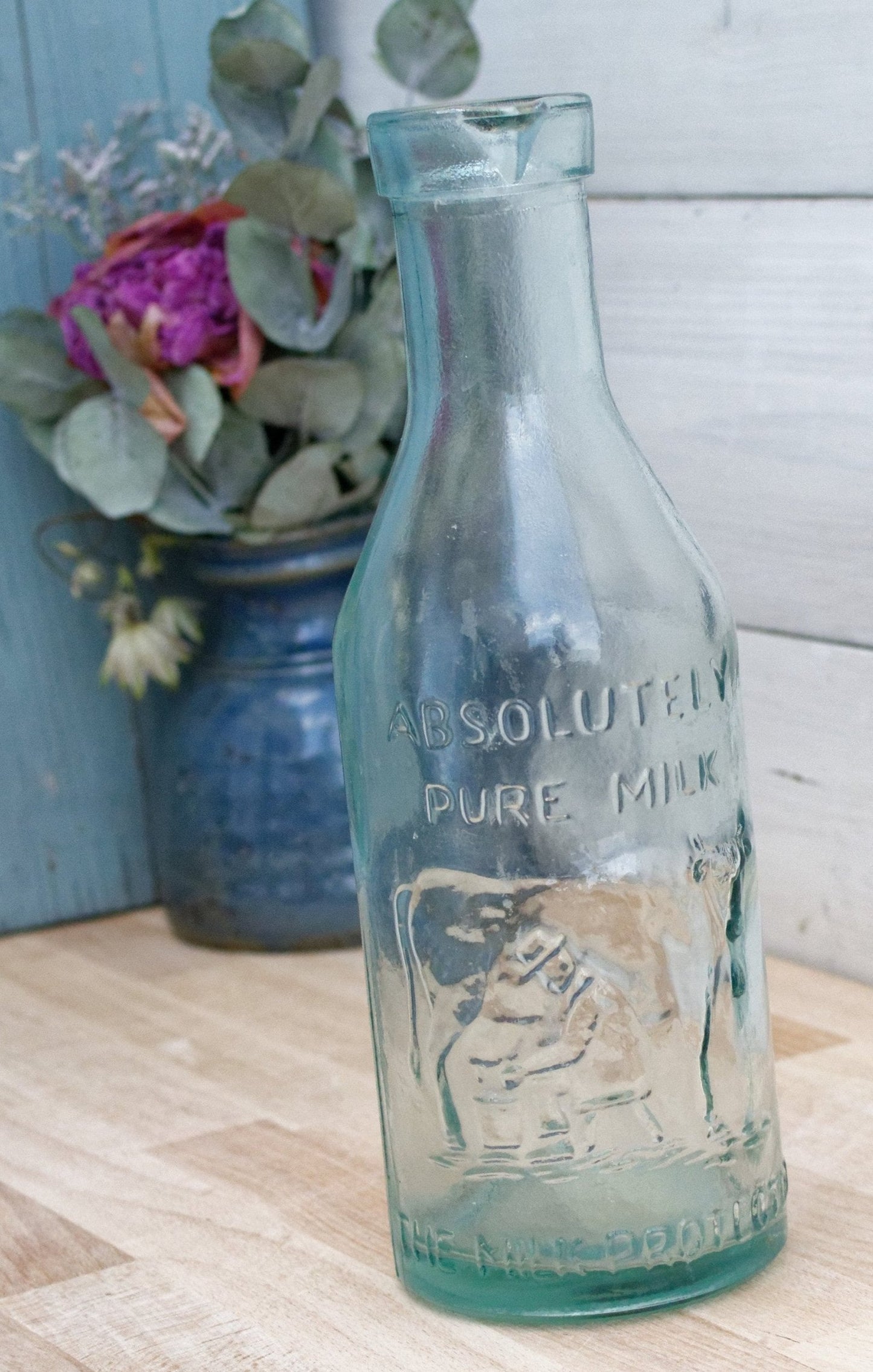 Vintage "ABSOLUTELY PURE Milk" Bottle  "The Milk Protector" Glass Milk Carafe 
Aqua Glassware Farmhouse Cow Scene