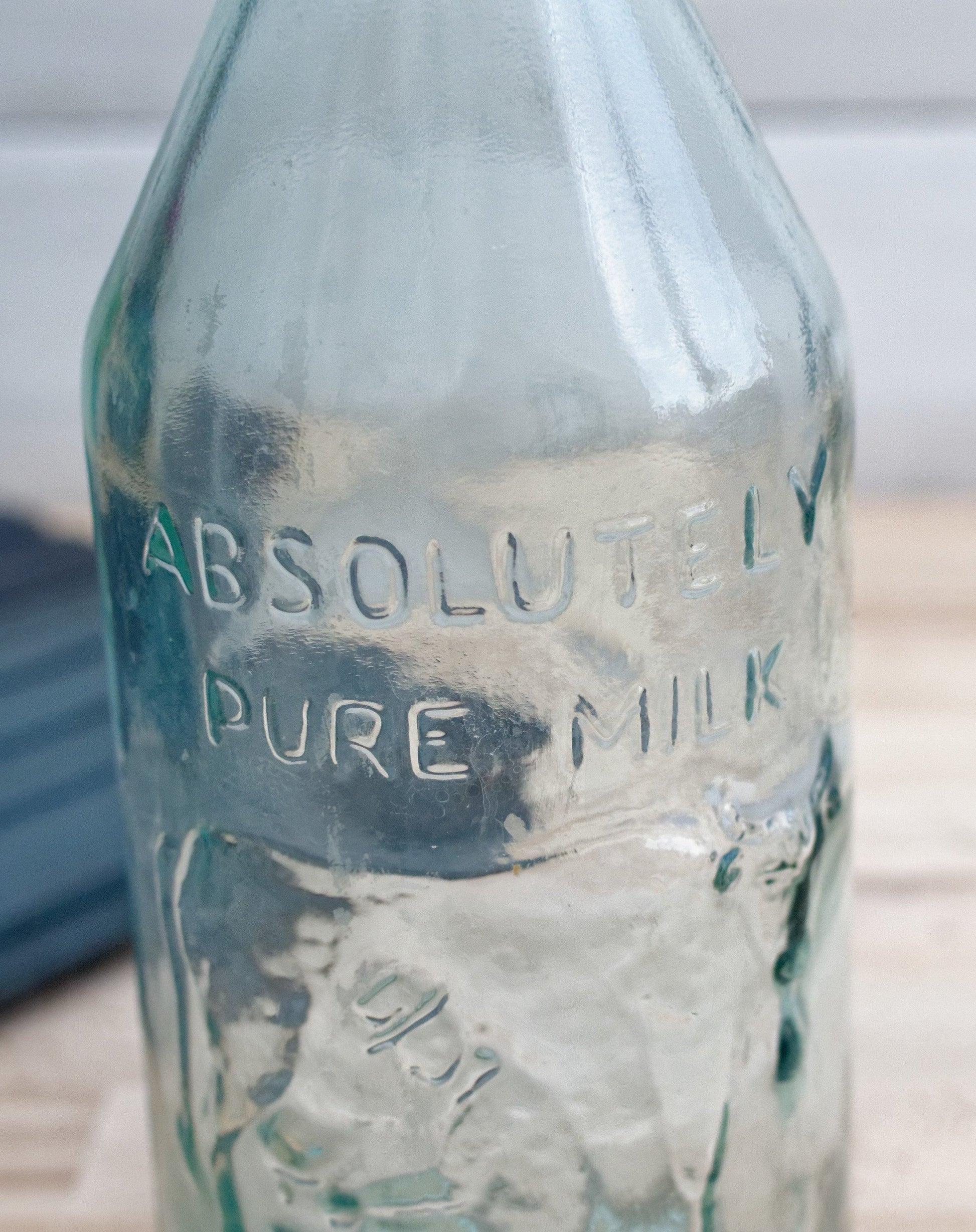 Vintage "ABSOLUTELY PURE Milk" Bottle  "The Milk Protector" Glass Milk Carafe 
Aqua Glassware Farmhouse Cow Scene