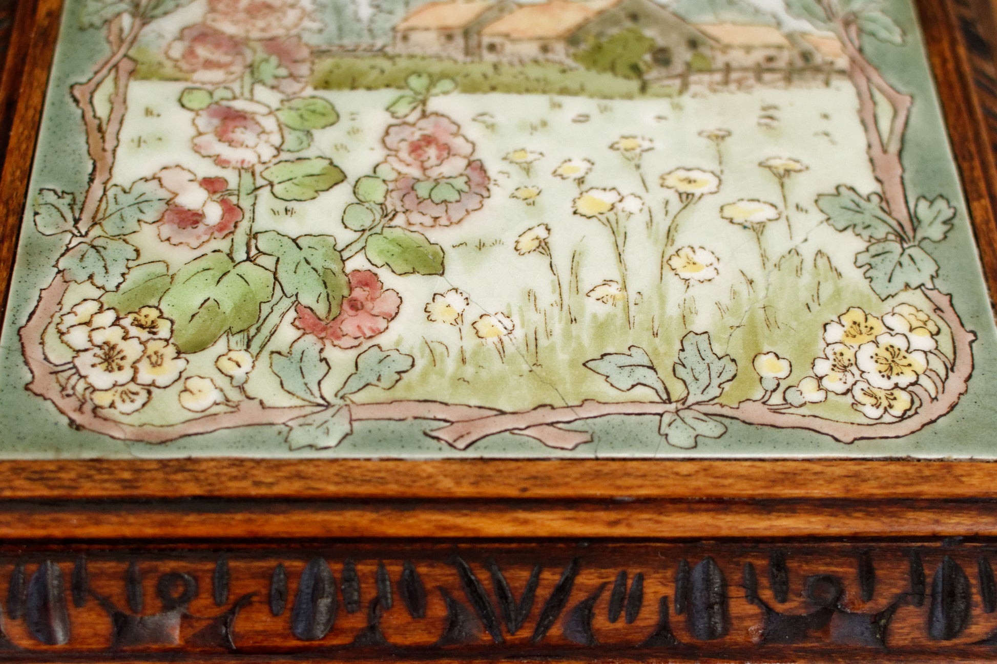 1920s French Antique Ceramic Tile Trivet Hot Plate with Hand-Carved Footed Wooden Base "Trépied Dessous de Plat en Faience" former music box