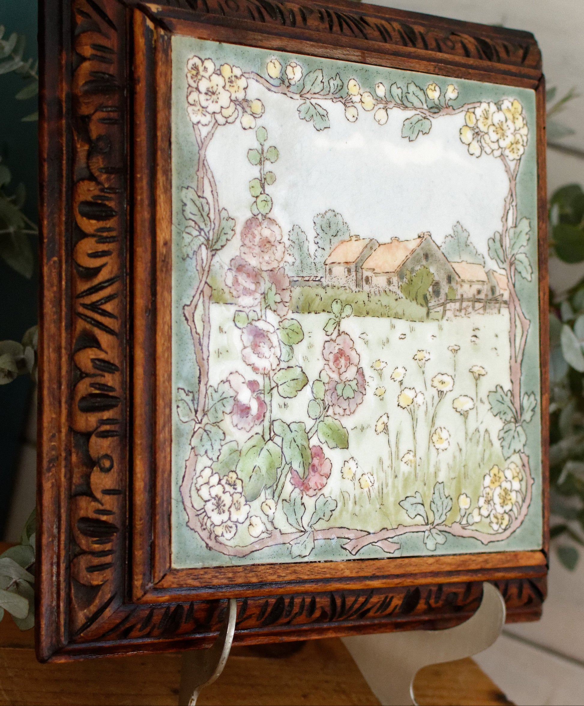 1920s French Antique Ceramic Tile Trivet Hot Plate with Hand-Carved Footed Wooden Base "Trépied Dessous de Plat en Faience" former music box