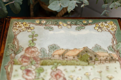 1920s French Antique Ceramic Tile Trivet Hot Plate with Hand-Carved Footed Wooden Base "Trépied Dessous de Plat en Faience" former music box