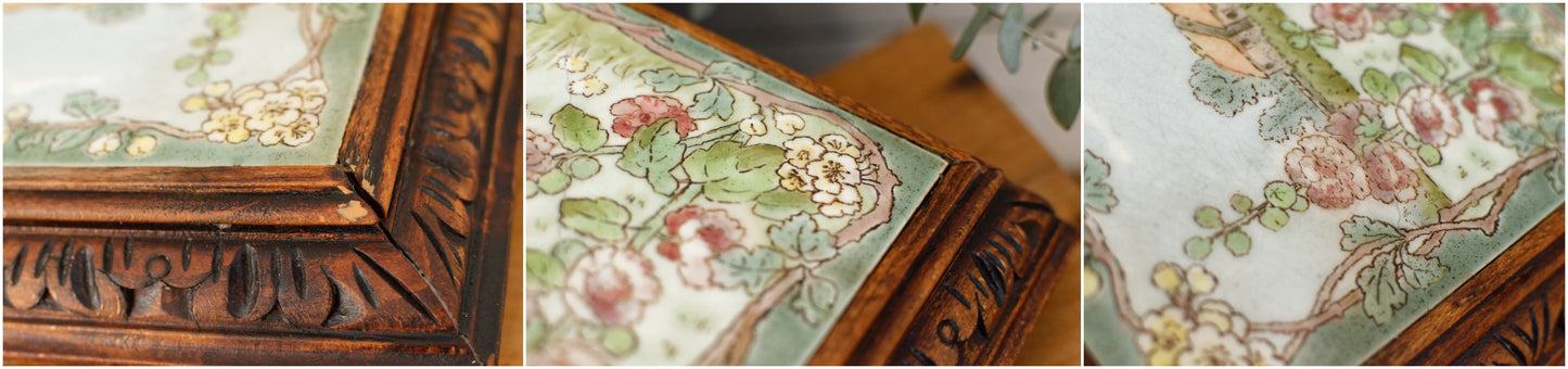 1920s French Antique Ceramic Tile Trivet Hot Plate with Hand-Carved Footed Wooden Base "Trépied Dessous de Plat en Faience" former music box
