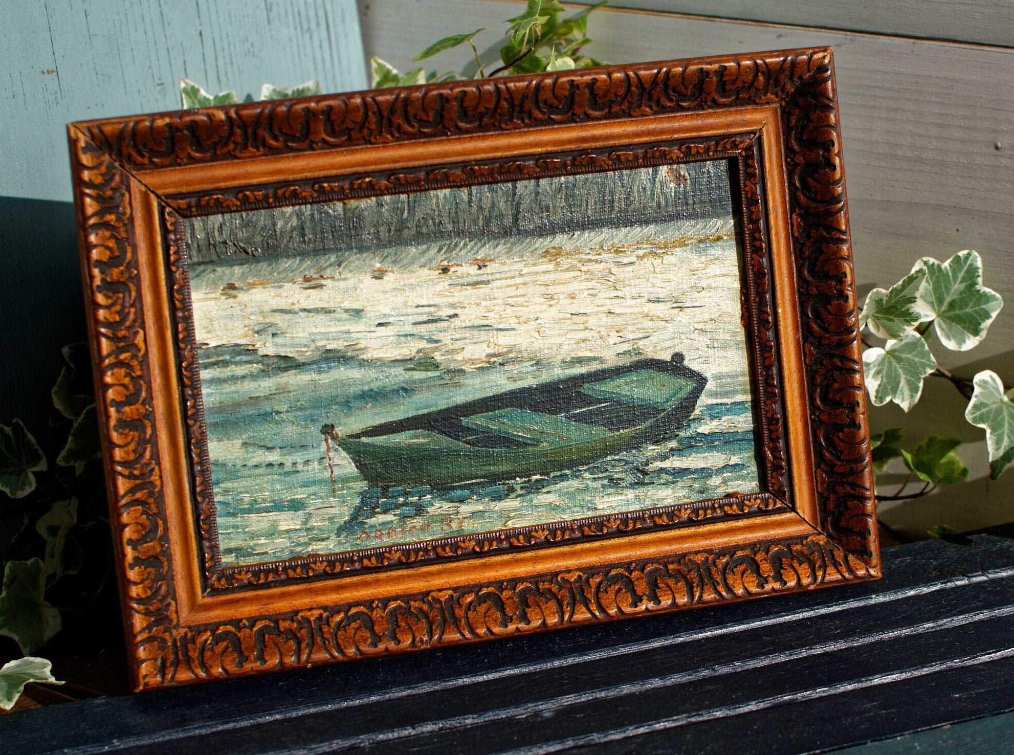 French water coloured engraving by Cembrier, 1930s, with very art deco gilt frame. Riverside scene 2024 with boat.